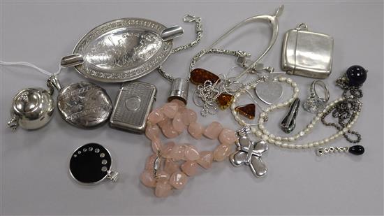 A group of mixed silver and jewellery, including A Victorian silver locket, a pair of silver wishbone sugar nips and an Art Deco clip